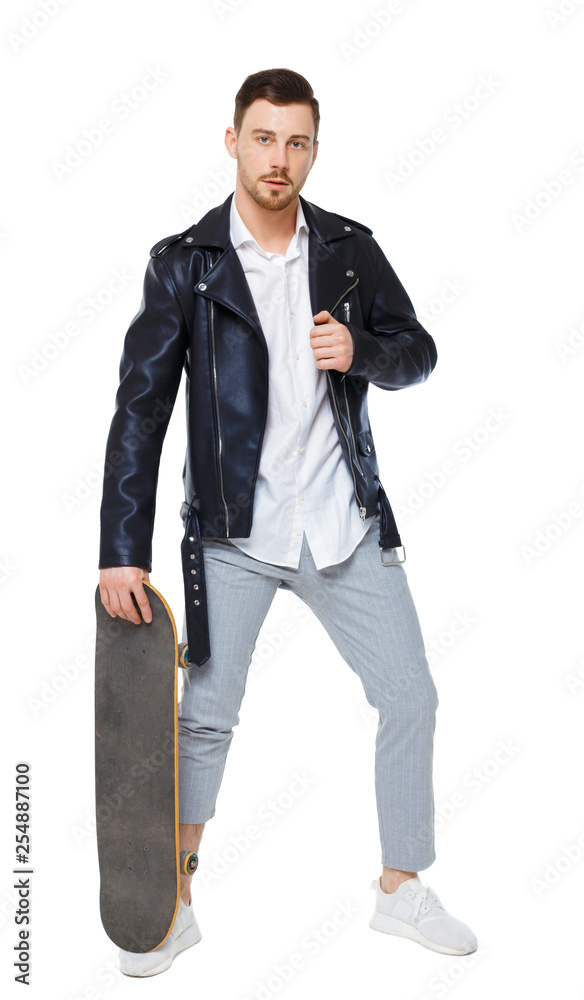 A man with a skateboard. A man with a skateboard.