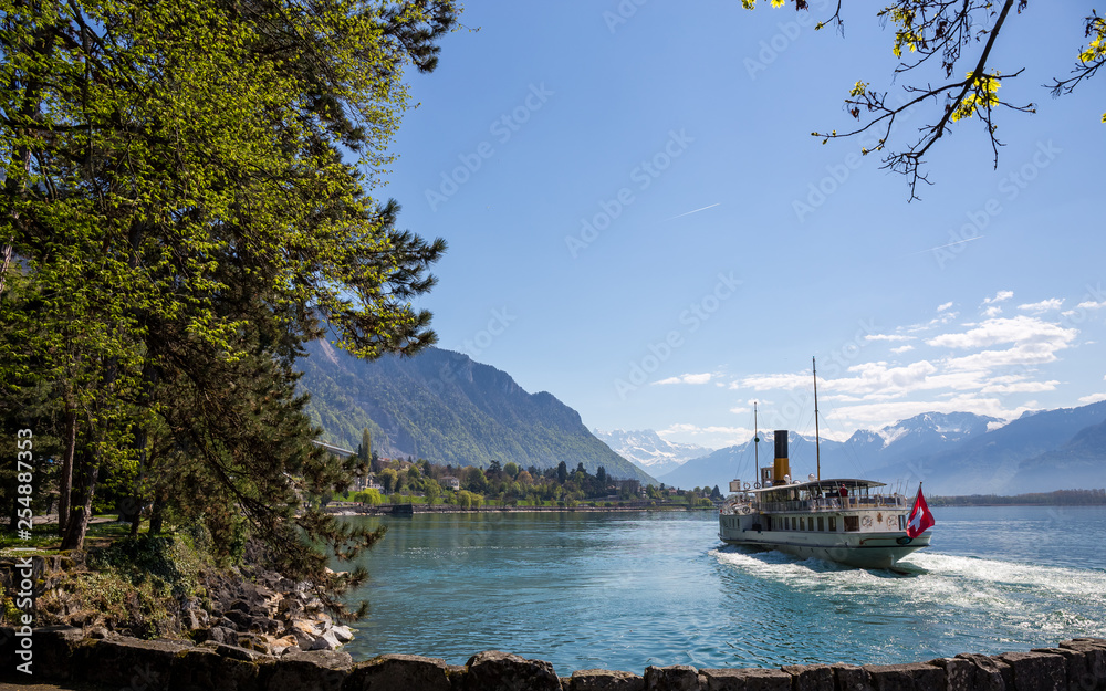 Naklejka premium Passager ship sailing on Geneva lake - Veytaux, Switzerland