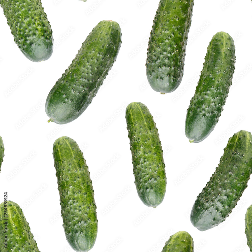 Heap of whole cucumbers isolated on white. Top view. Vegetable background. Seamless pattern. Food texture. Heap of whole cucumbers isolated on white. Top view. Vegetable background. Seamless pattern. Food texture.