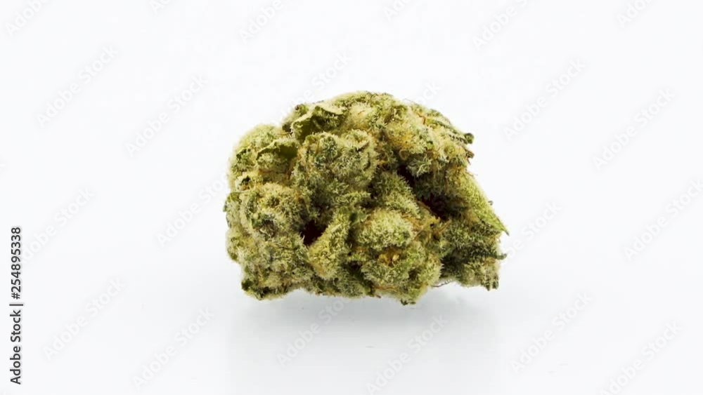 360 Degree Looping Rotation of the Marijuana Strain - Soul Assassin, Single Bud, Center Screen, in 4K Ultra HD Resolution 3840x 2160 on White Background. 360 Degree Looping Rotation of the Marijuana Strain - Soul Assassin, Single Bud, Center Screen, in 4K Ultra HD Resolution 3840x 2160 on White Background.