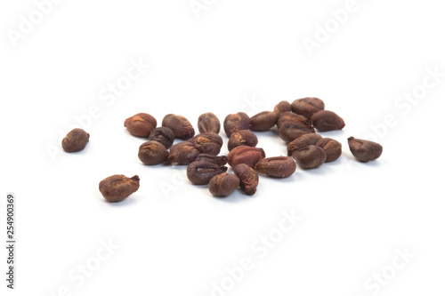 Stack of dried grape seeds isolated on white background