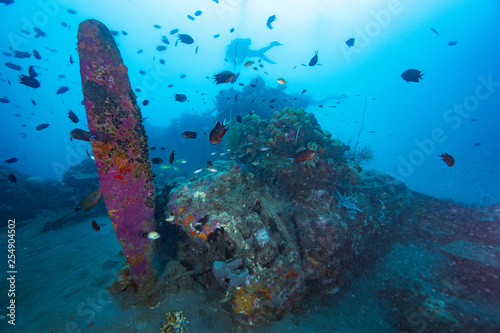 WWII Bomber Wreck underwater with propeller an scuba diver, near Honiara, Solomons