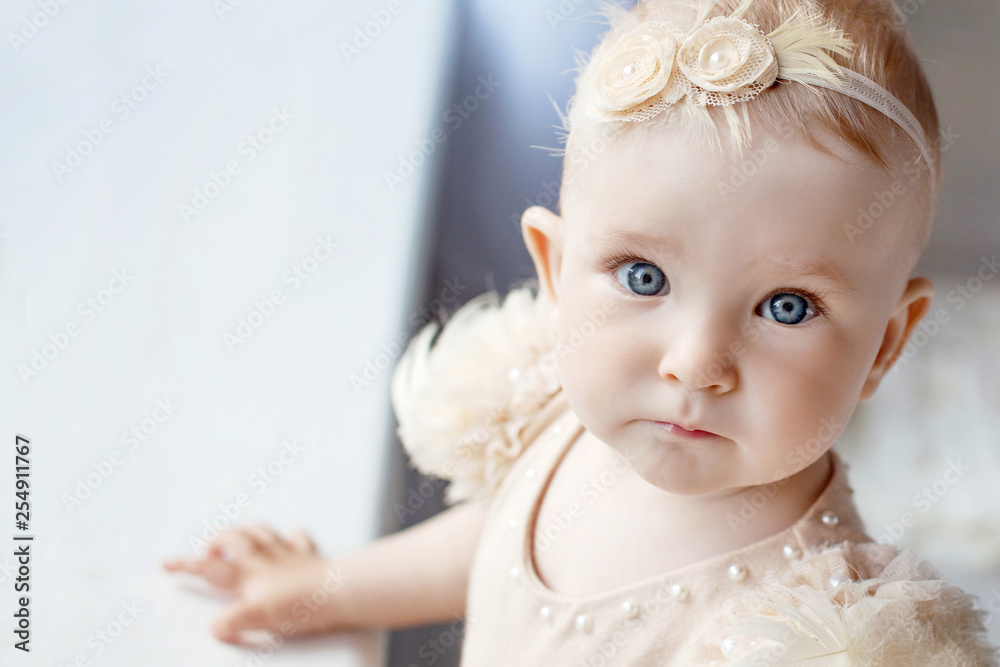 Portrait of the lovely little girl with blue eyes. Serious quiet look. Copy space Portrait of the lovely little girl with blue eyes. Serious quiet look. Copy space