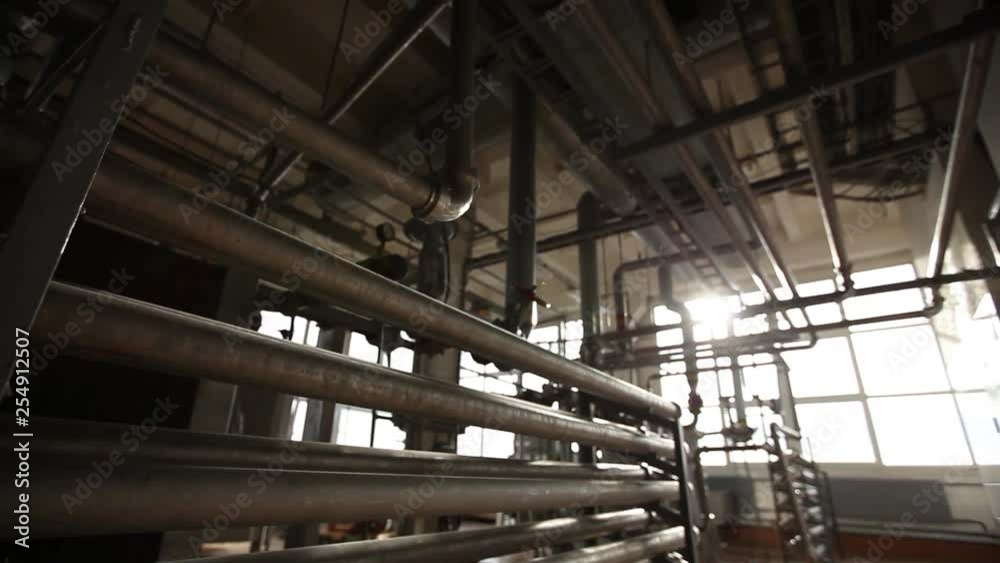 many pipes and valves in the factory many pipes and valves in the factory