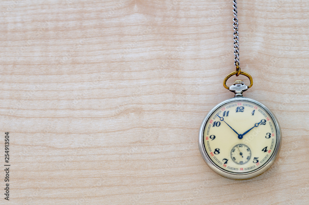 mechanical hand watch on wooden background mechanical hand watch on wooden background
