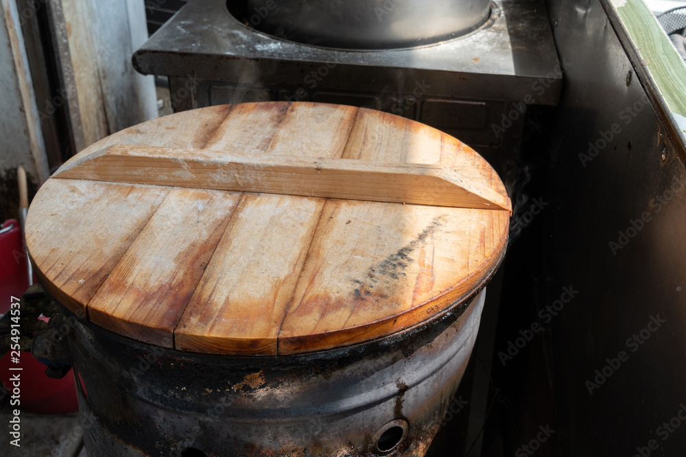 Fototapeta premium A cooking pot isolated on a stove top