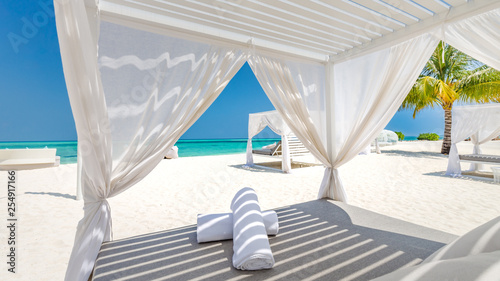 Serenity beach background, luxury beach canopy and travel or summer vacation concept 