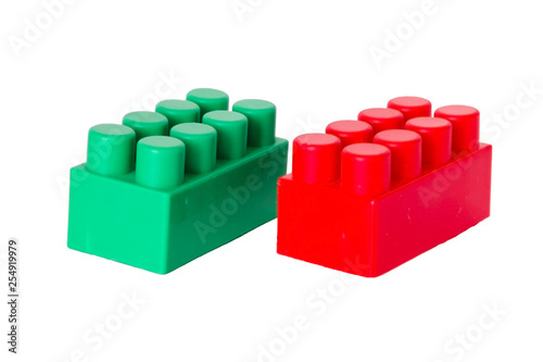 details of a children s plastic constructor on a white background. colored cubes. block.