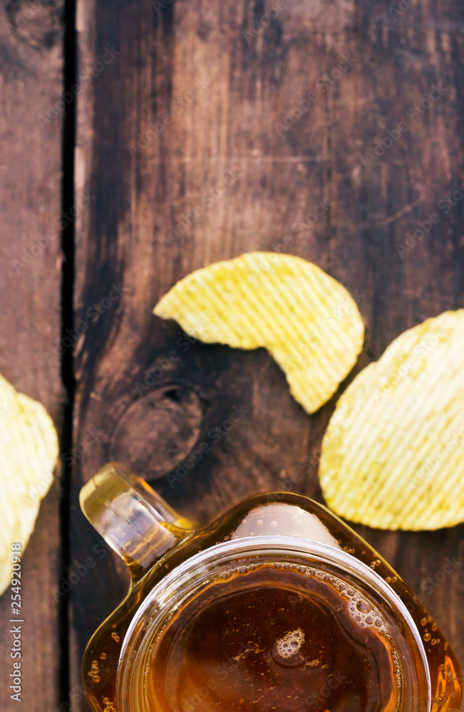 Glass of cold beer on wooden background Glass of cold beer on wooden background