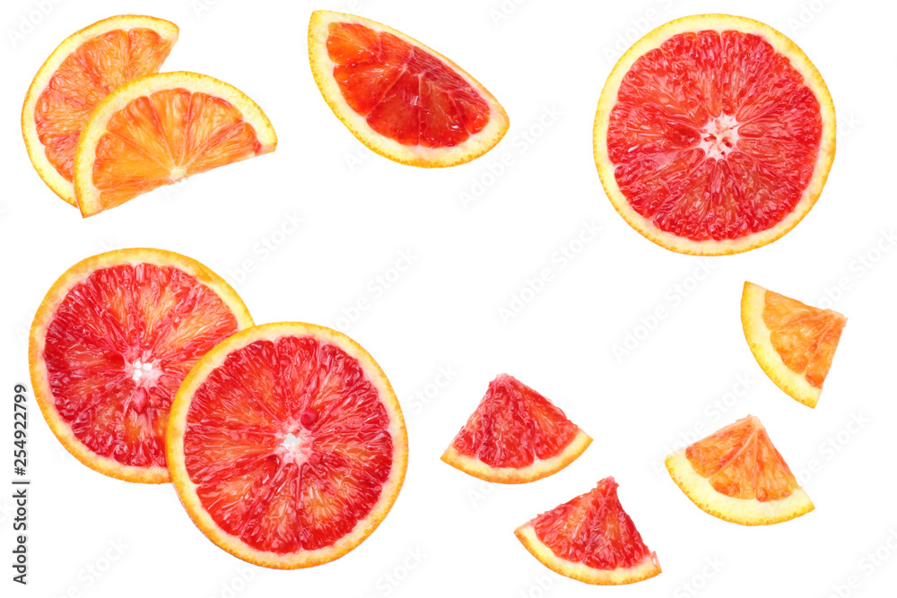 Red blood orange fruit with slices isolated on white background. top view Red blood orange fruit with slices isolated on white background. top view