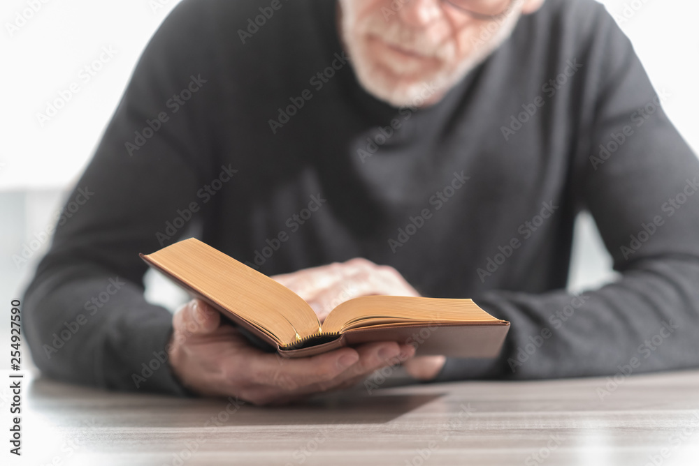 Man reading a book Man reading a book