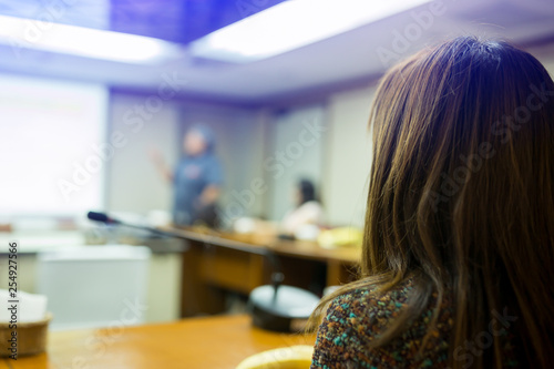 blurry of an business woman conference in meeting room