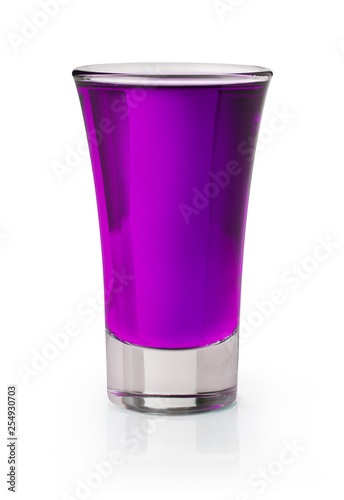Purple shooter in a shot glass on white background