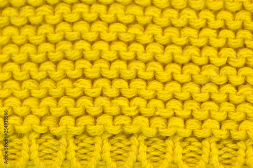 Yellow background of knitted