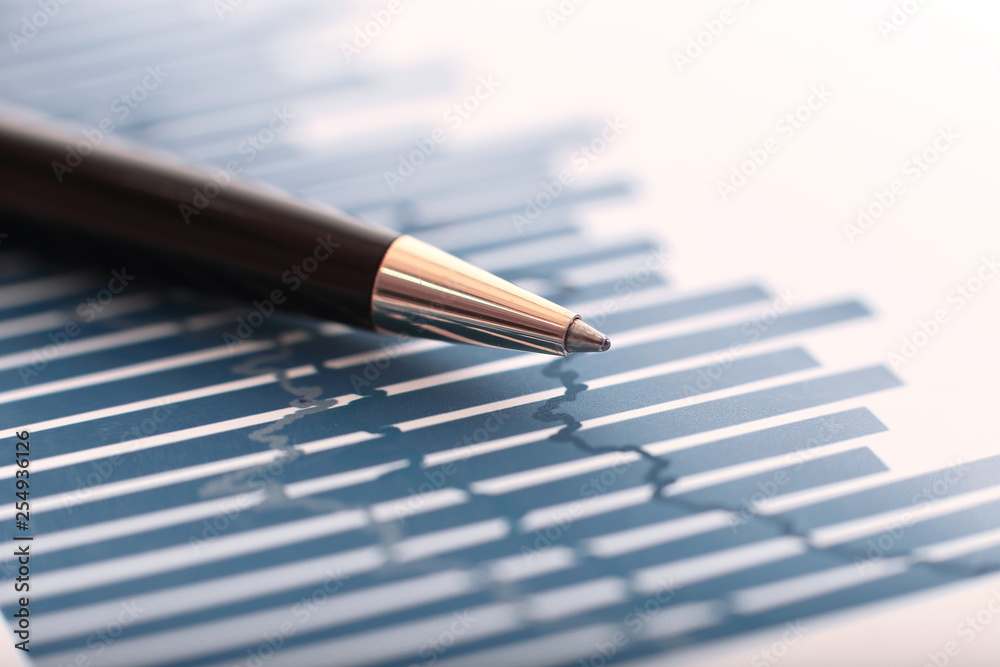 Fototapeta premium close up. ballpoint pens and business data on the Des