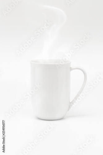 A white tall mug with steam floating