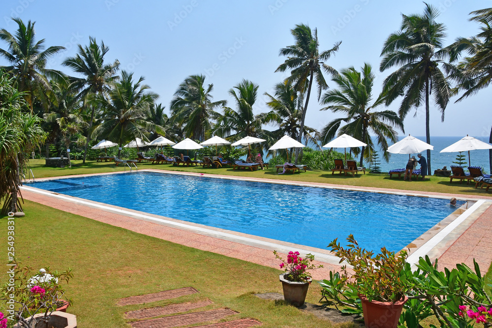  Kerala, India. Typical pool on the store of Indian ocean