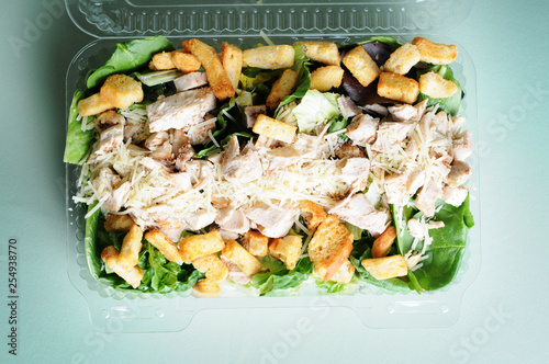 Fresh Grilled Chicken Caesar Salad in To Go Container - Healthy Eating Diet