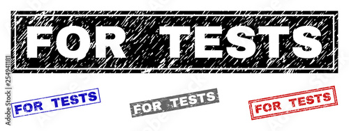 Grunge FOR TESTS rectangle stamp seals isolated on a white background. Rectangular seals with grunge texture in red, blue, black and gray colors.
