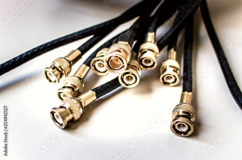 фотографія BNC jack with black coaxial cable for video and audio signal or CCTV system on w