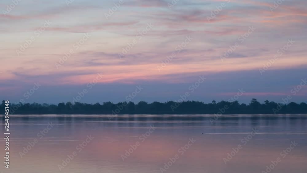 Sunrise in a rural area overlooking the Ma khong river at Jampasak, Laos, Time lapse., Lockdown. Sunrise in a rural area overlooking the Ma khong river at Jampasak, Laos, Time lapse., Lockdown.