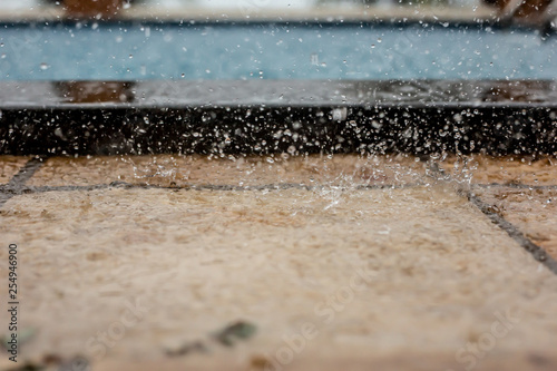 rain water from the roof of a house