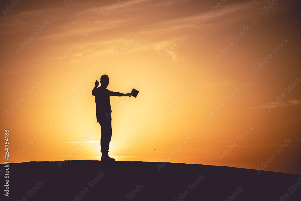 woman like a litte girl playing on the sun of dubai woman like a litte girl playing on the sun of dubai