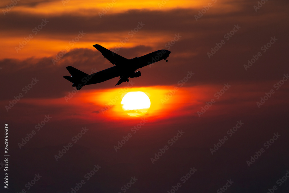 airplane taking off airport sky-diving industry cargo business, concept: passenger Commercial  modern navigable Travel and business,Silhouette aircraft is flying above skyline sun