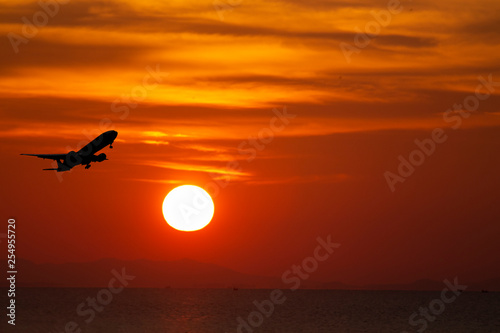 airplane taking off airport sky-diving industry cargo business, concept: passenger Commercial  modern navigable Travel and business,Silhouette aircraft is flying above skyline sun
