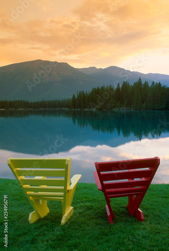 Two chairs by Beufort Lake at sunset  Jasper Lodge  Jasper National Park  Alberta  Canada