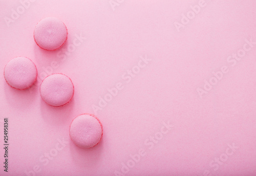 pink macaroons on pink background