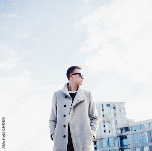 Wallpaper Mural Portrait of young handsome man in coat outdoor.  Torontodigital.ca