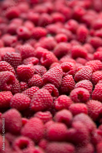 View of heap of raspberries...