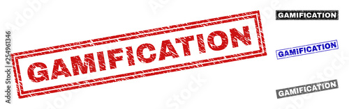 Grunge GAMIFICATION rectangle stamp seals isolated on a white background. Rectangular seals with distress texture in red, blue, black and gray colors.