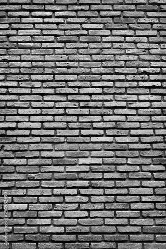 Surface of gray brick stone wall textured for background