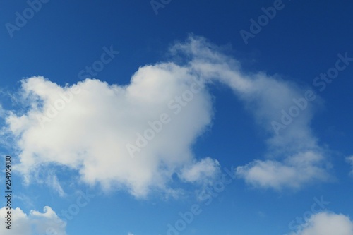 Beautiful heart shape cloud in blue sky  natural background