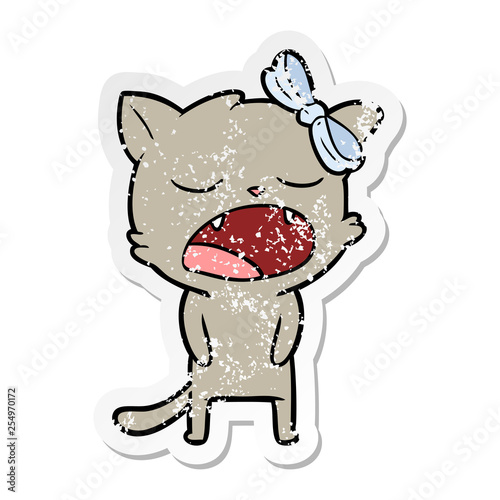 distressed sticker of a cartoon cat meowing
