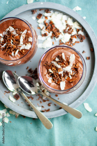 Homemade vegan chocolate mousse with coconut creamand cocoa