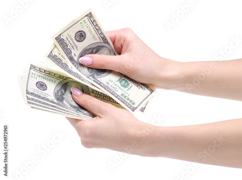 Money dollars currency in hand on white background isolation