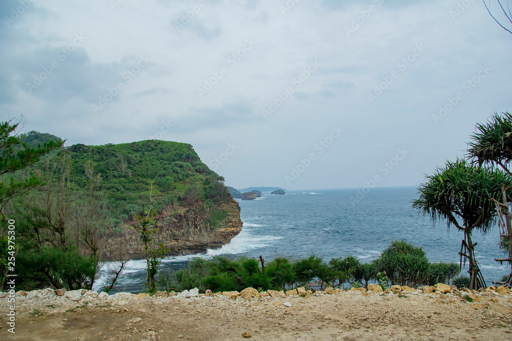 timang beach with beautiful view waves and cliffs