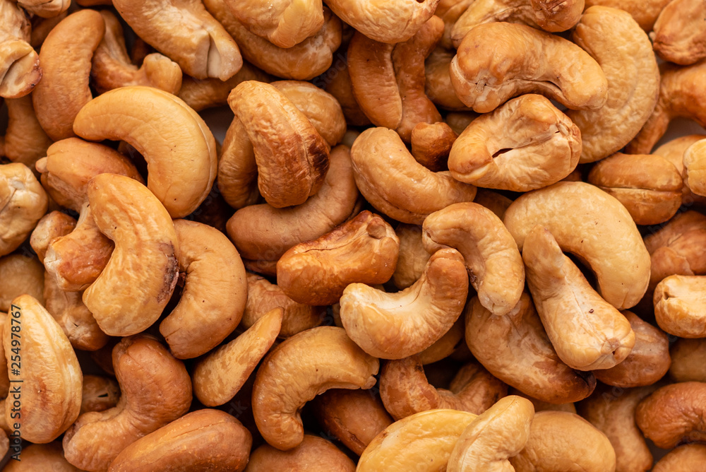 Cashew nuts close up. Breakfast, healthy food. It can be used as a background Cashew nuts close up. Breakfast, healthy food. It can be used as a background