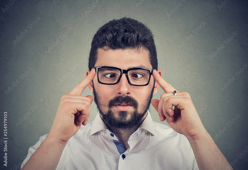 Fototapeta premium Man in glasses with strabismus