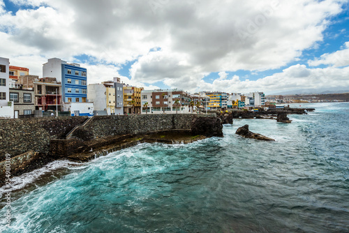 Tourism and travel. Windy day on the ocean. Rocky coast. Canary Islands, Gran Canaria, Atlantic Ocean. Tropics. City of Las Palmas © Nataliya Schmidt