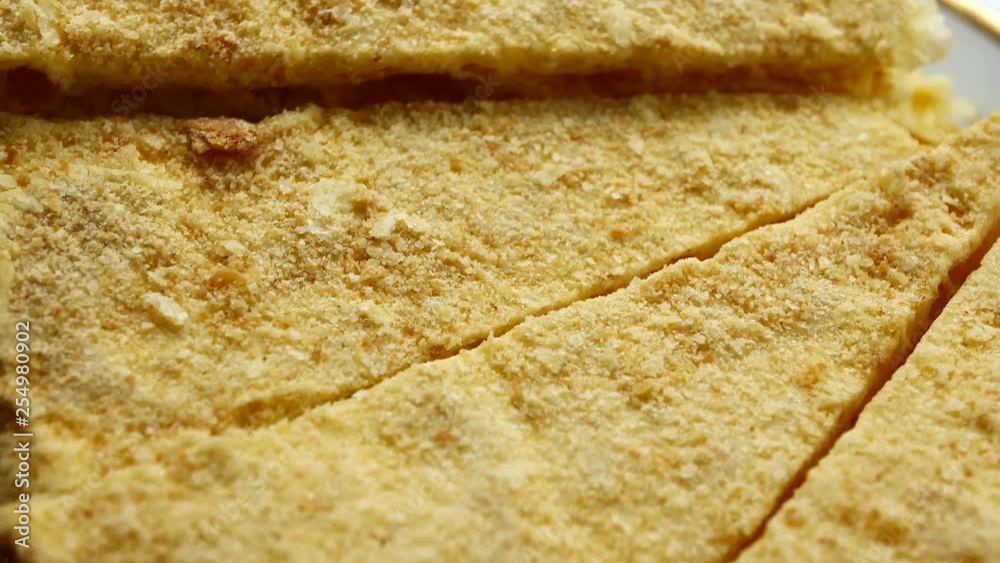 Napoleon cake with custard on platter Napoleon cake with custard on platter