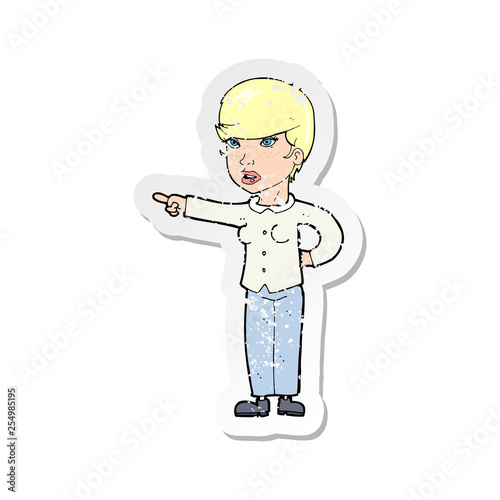 retro distressed sticker of a cartoon woman pointing finger of blame
