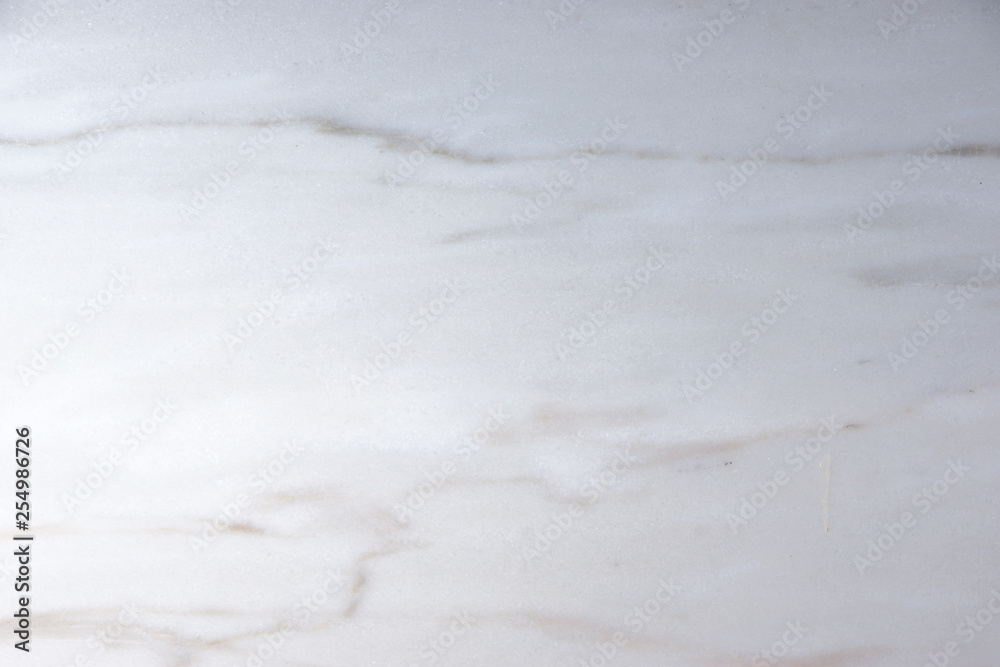 Obraz premium Natural stone of white color with gray streaks