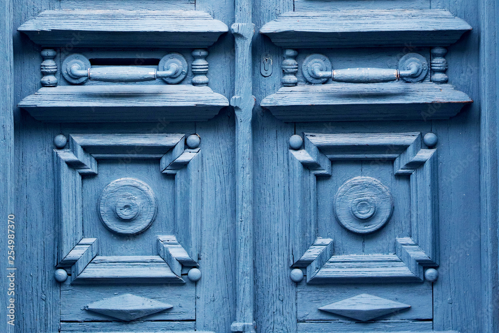 Blue wooden antique doors, close-up