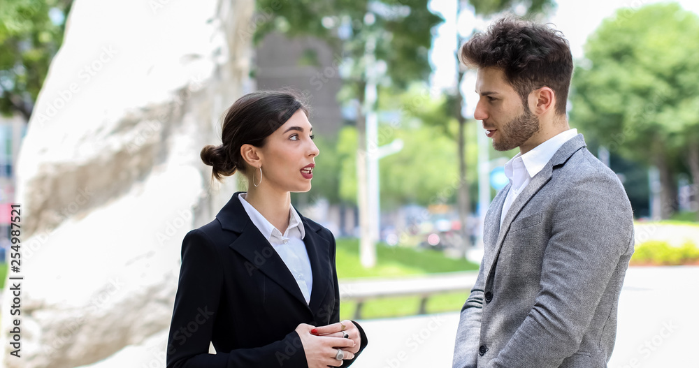 Business partners discussing together Business partners discussing together