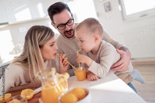 Family drink fresh orange juice