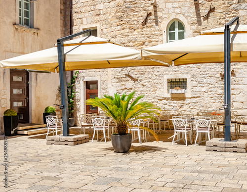 Tables in the restaurant in the open air. photo